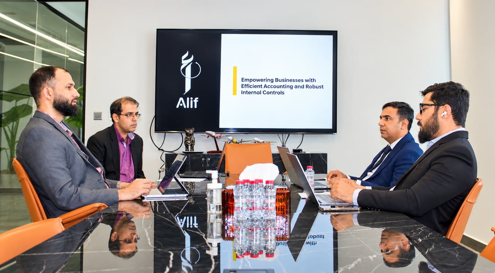 The Alif Consulting team in a client meeting