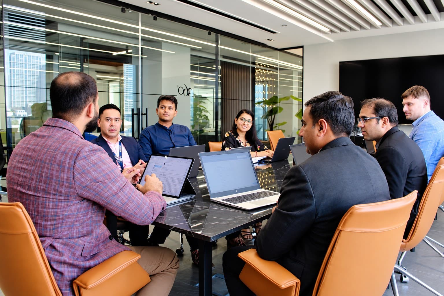 The Alif Accounting & Tax Consultants team together in the office